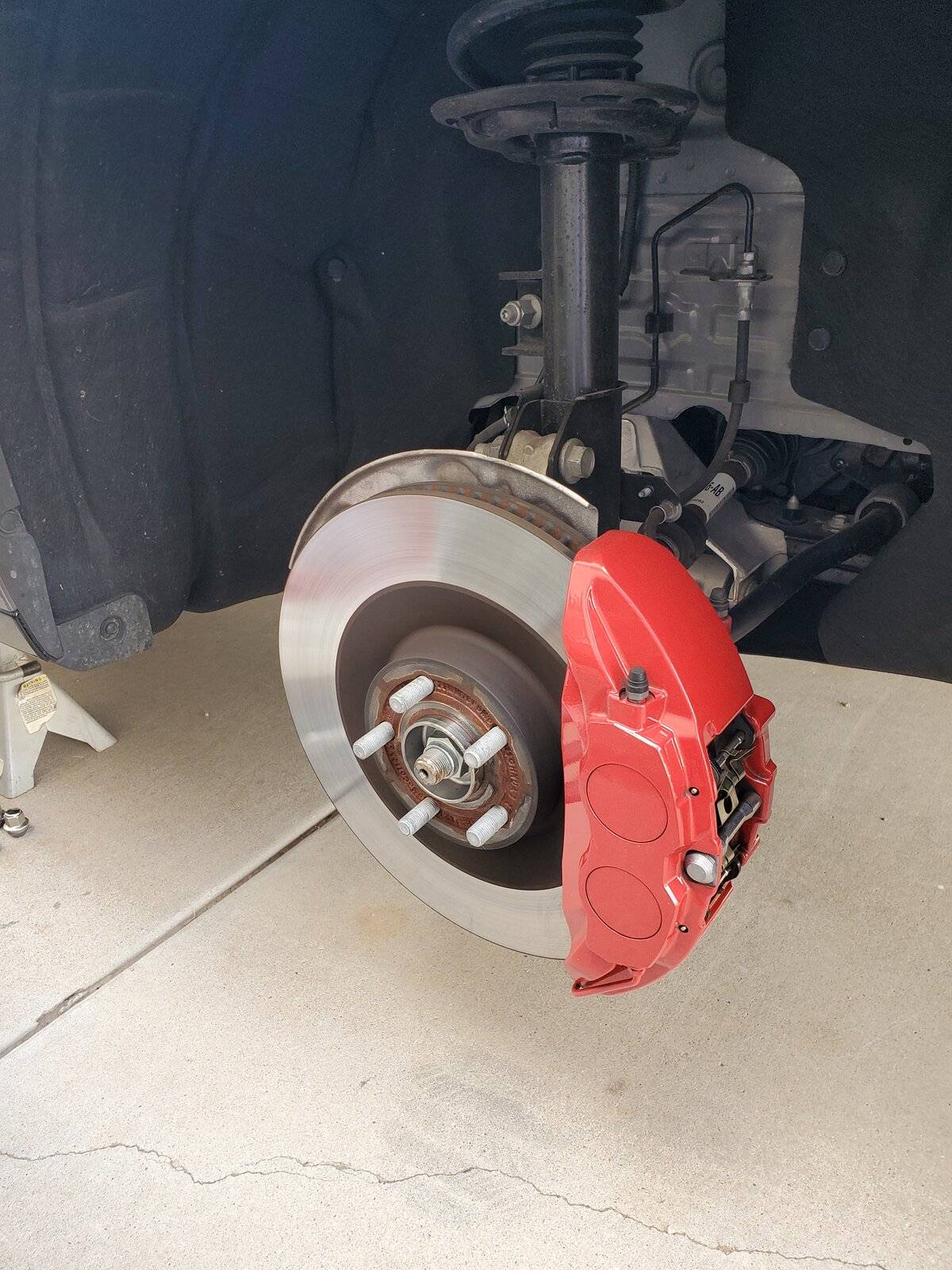 Ford Mustang Mach-E Rotating tires at 21k miles 20211017_133323