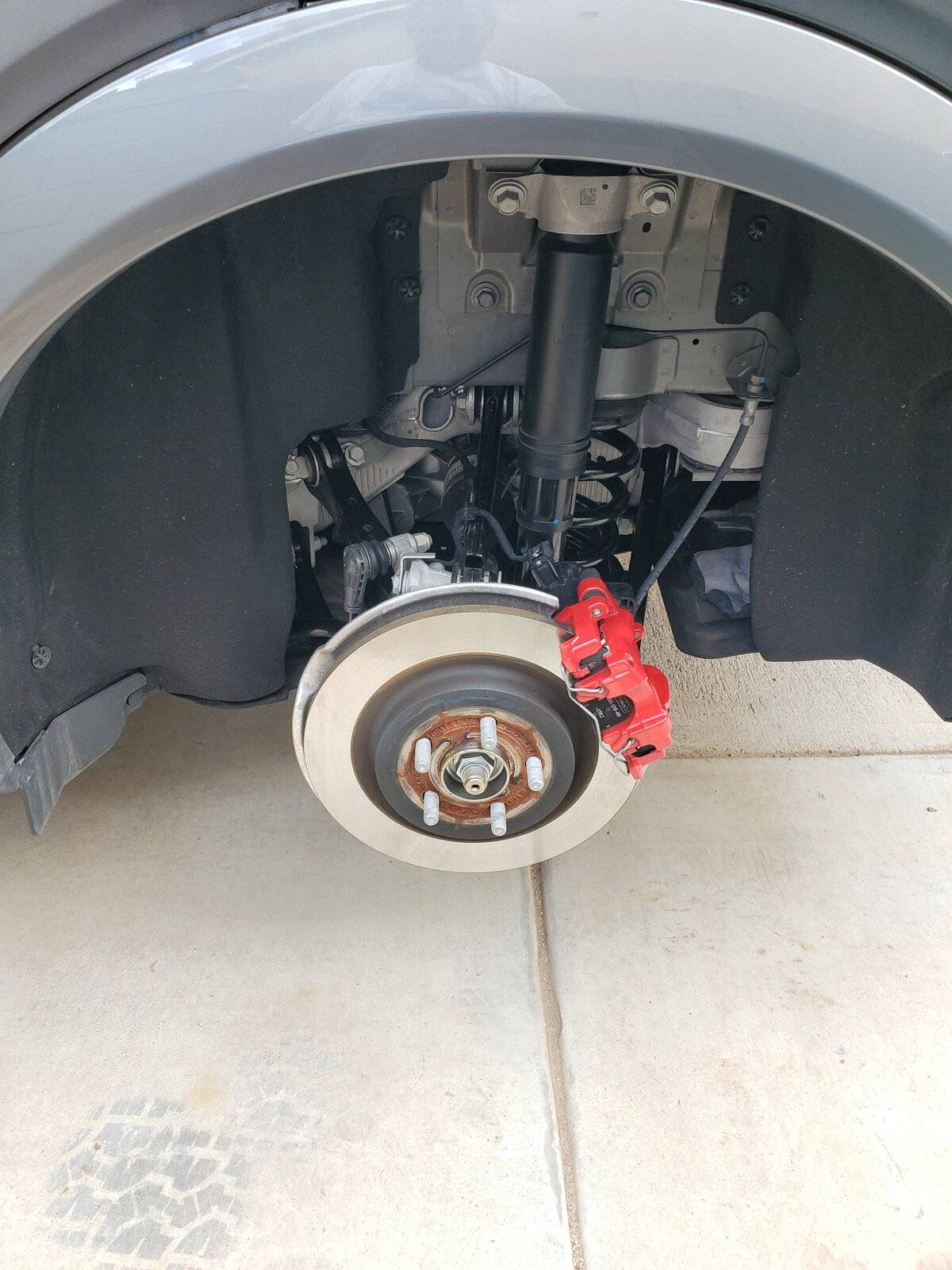 Ford Mustang Mach-E Rotating tires at 21k miles 20211017_142723
