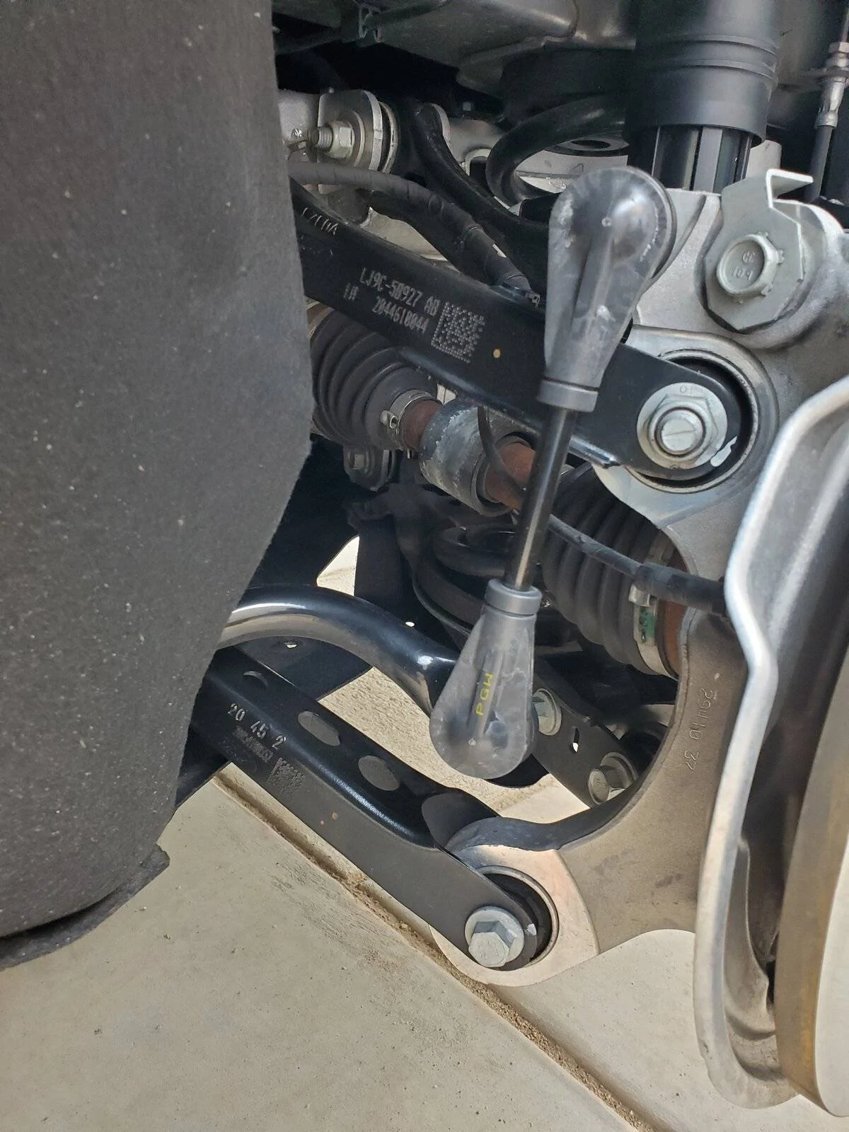 Ford Mustang Mach-E Rotating tires at 21k miles 20211017_142821