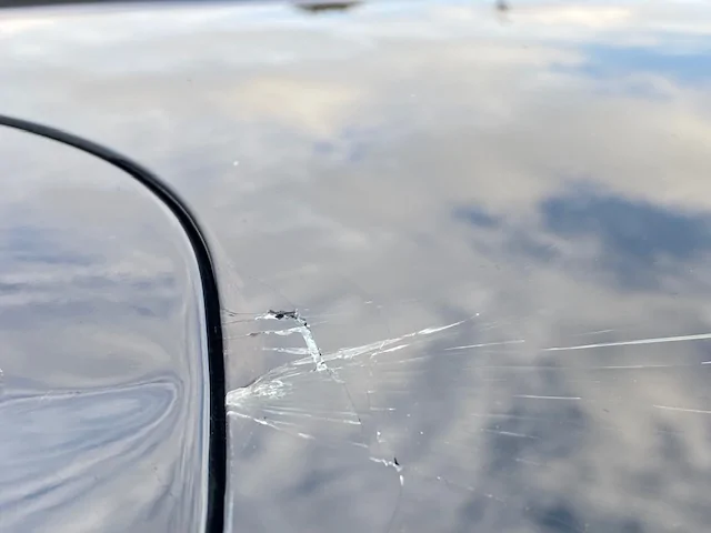 Ford Mustang Mach-E OH NOOOooooo cracked top glass backing out of garage IMG_3890