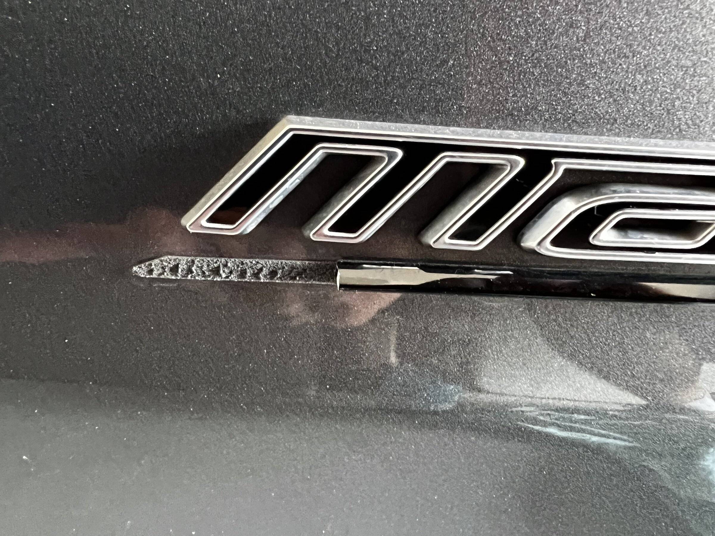 Ford Mustang Mach-E Mach E 4X badge is peeling off 30642FFD-B057-40AF-8510-575B8C1B9D6F