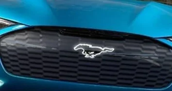 2021-Ford-Mustang-Mach-E-GT-Backlit-Pony-Logo-Exterior-001-Front.jpg