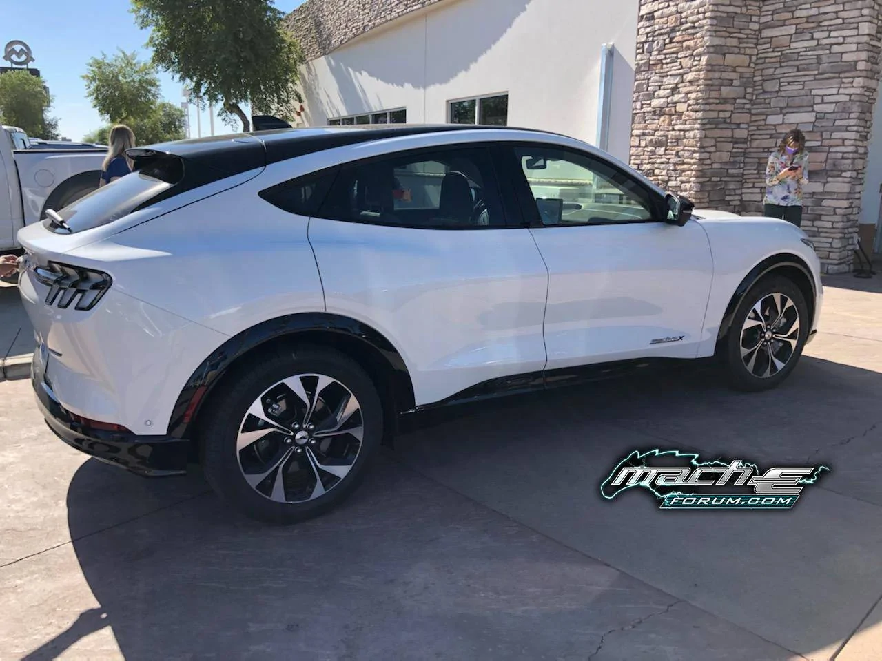 Ford Mustang Mach-E Mach-E 4x (Star White / Gray Interior) sighted at Phoenix dealership, with a look at range figures Star White Mach-E 1