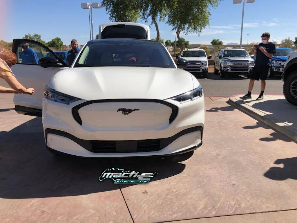 Ford Mustang Mach-E Mach-E 4x (Star White / Gray Interior) sighted at Phoenix dealership, with a look at range figures Star White Mach-E 2