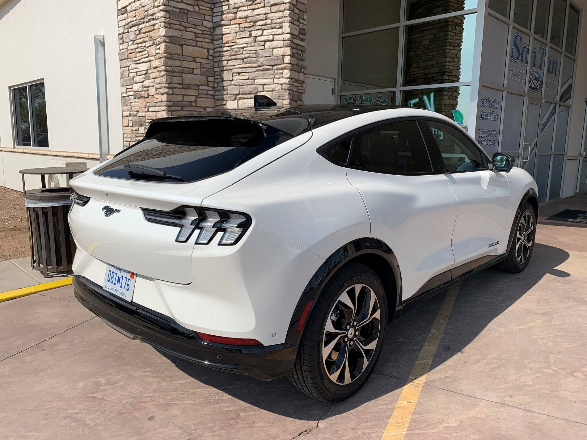 Ford Mustang Mach-E Mach-E 4x (Star White / Gray Interior) sighted at Phoenix dealership, with a look at range figures Back