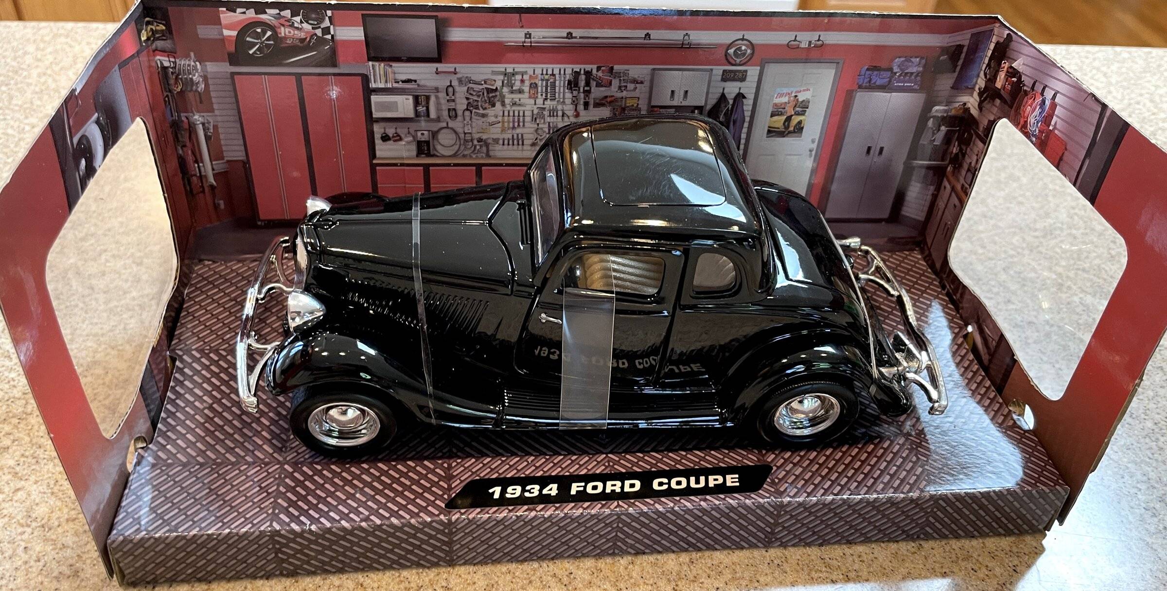 Ford Mustang Mach-E Die Cast 1/24th 1934 Five Window Ford Coupe 1934 Ford Coupe inside box.JPG