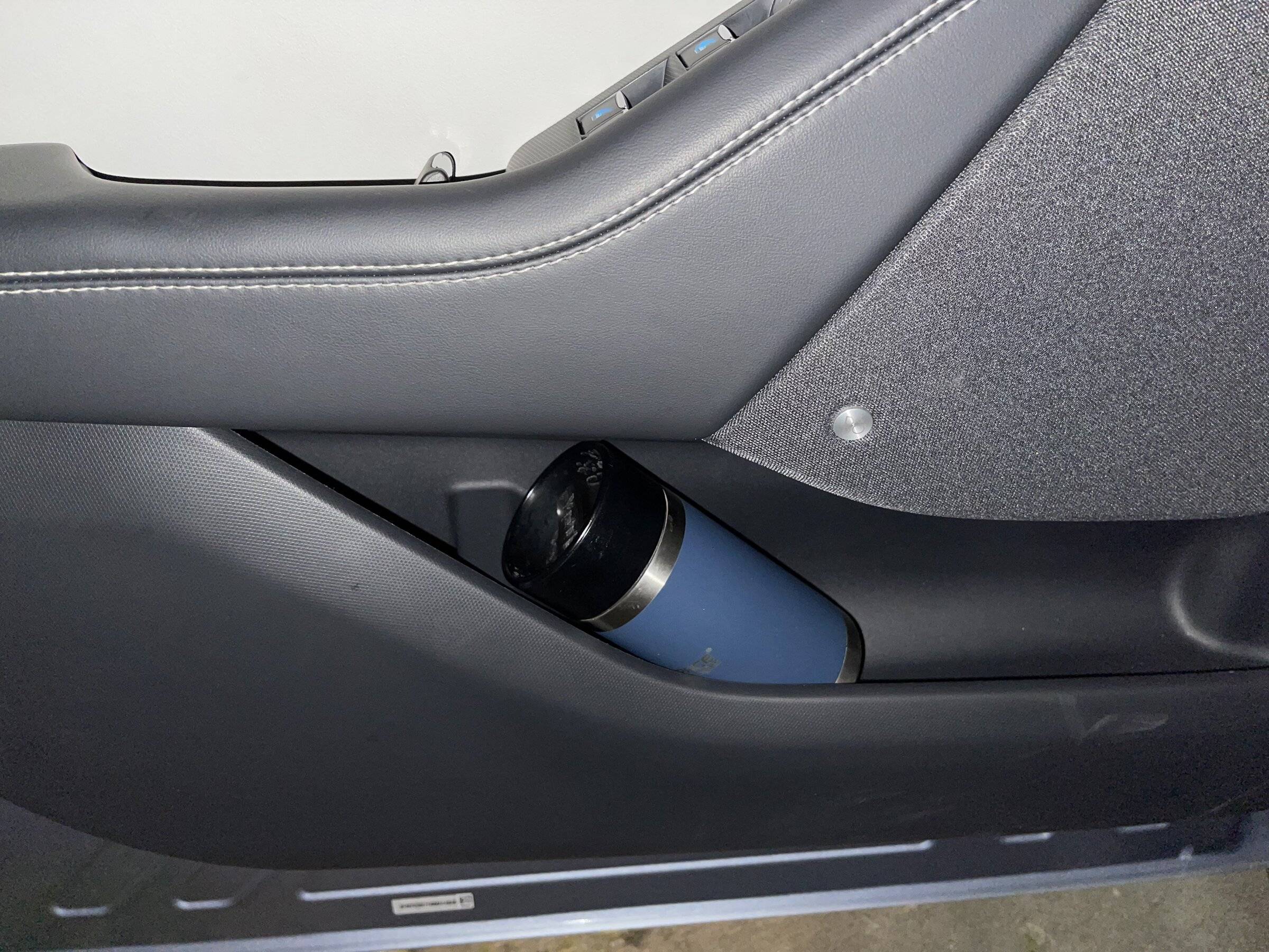 Ford Mustang Mach-E Door pockets. Useless waste of space. 7DA1E2CC-F14B-4280-A034-56292C6BE120