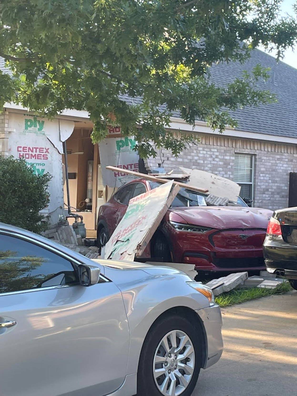 Ford Mustang Mach-E Unbridled Mach-E Proves Its Mustang Credentials By Crashing Through Own Garage Wall Mustang-Mach-E-wall-crash-00002
