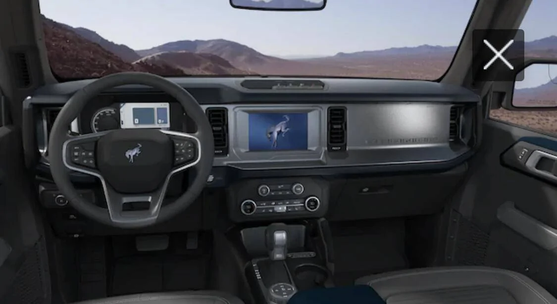 Ford Mustang Mach-E Interior Changed - no more white accent on steering wheel 1605364047969