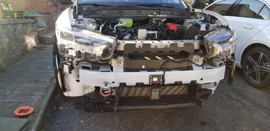 Ford Mustang Mach-E DIY - How to install a front tow ring at the front bumper knockout cover. Tow ring - perspective view