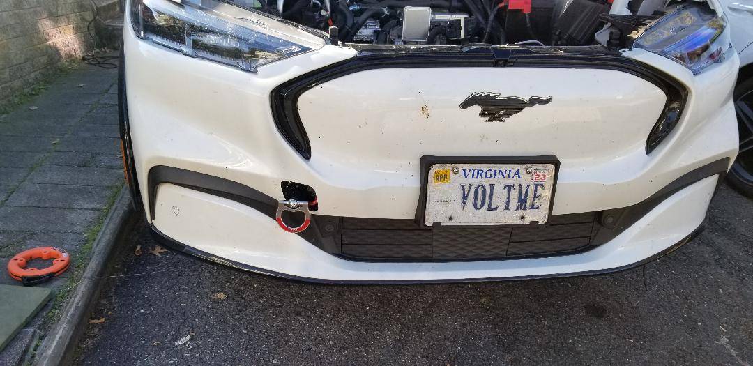 Ford Mustang Mach-E DIY - How to install a front tow ring at the front bumper knockout cover. Tow ring - assembled bumper cover view