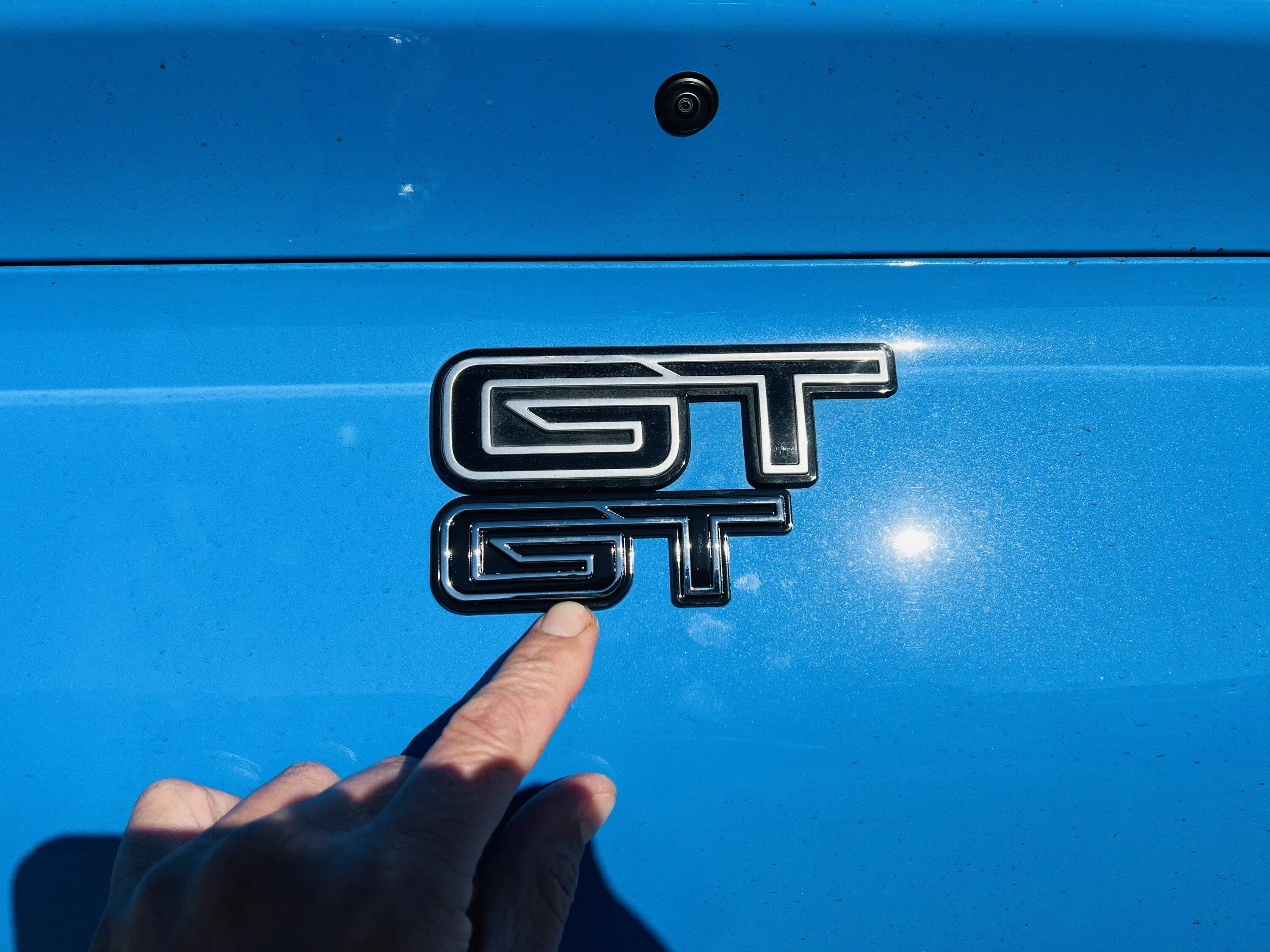 Ford Mustang Mach-E The GT emblem on the CN version front lower door. 386099DC-EEC9-4E14-ABE2-BDB4367EA09A