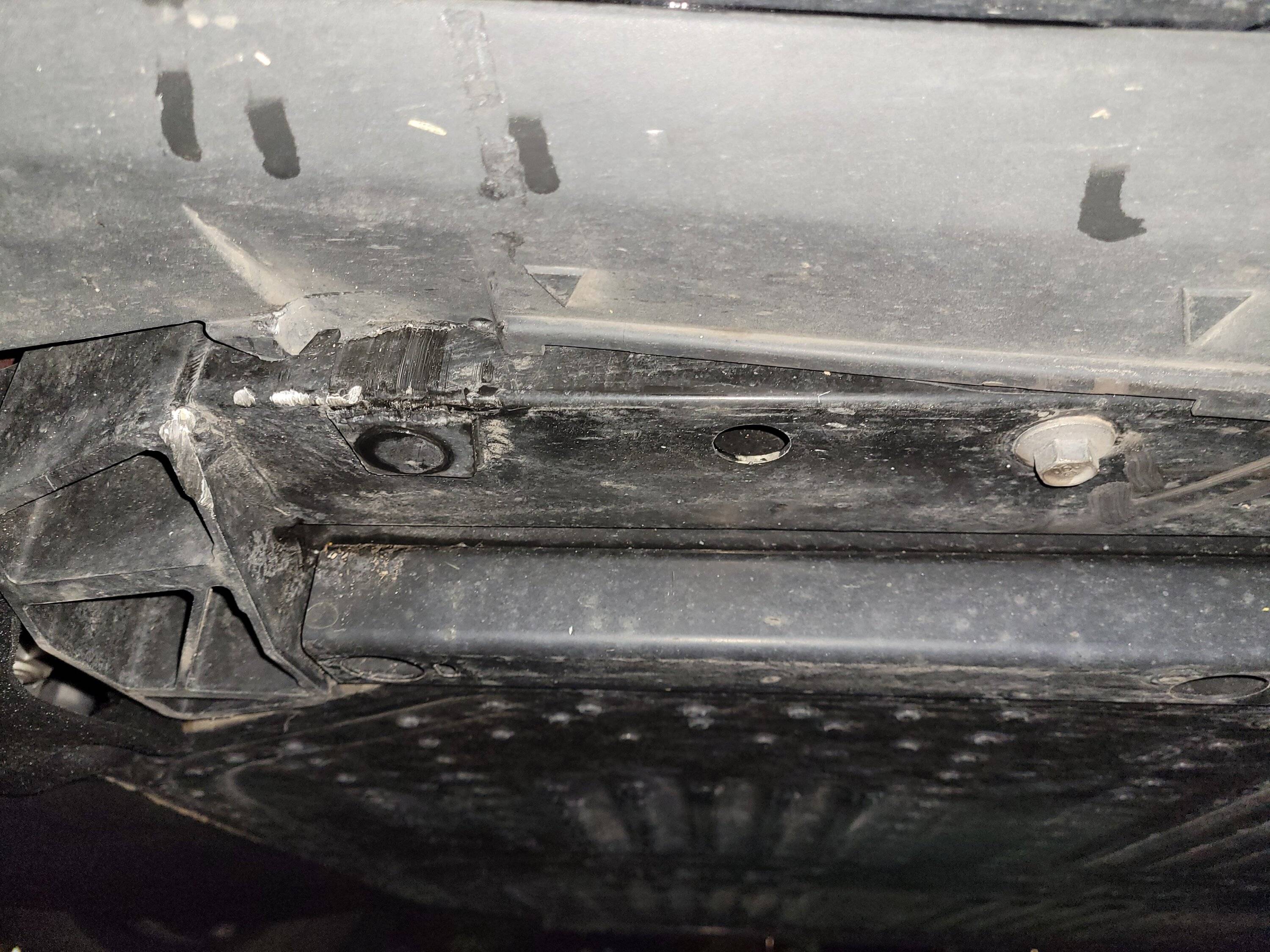 Ford Mustang Mach-E Damaged from jack slipping off lift rail 20230110_173756