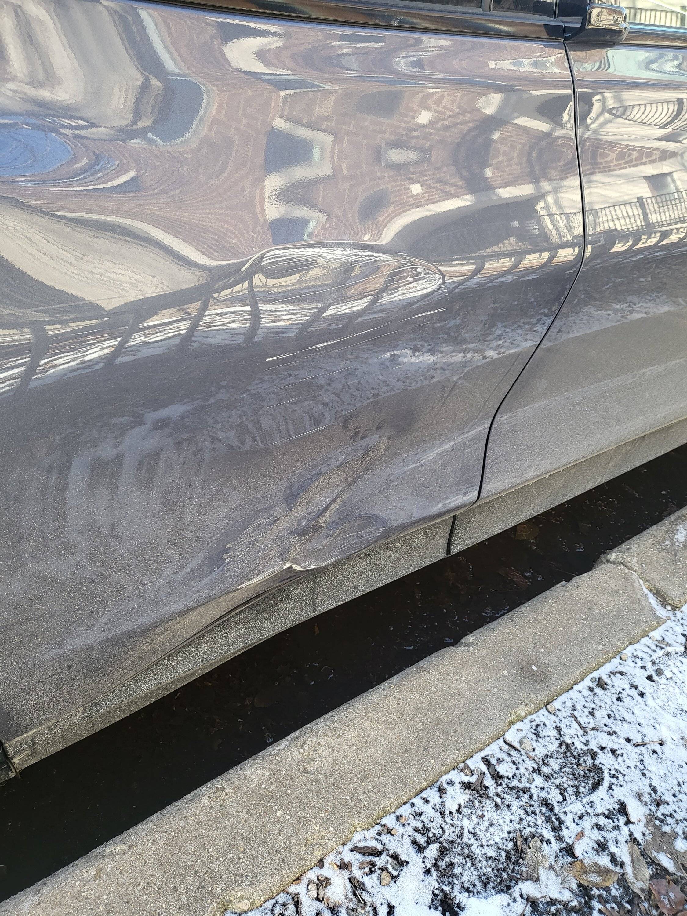 Ford Mustang Mach-E Door hit a pole, repair or replace? 20230123_140011
