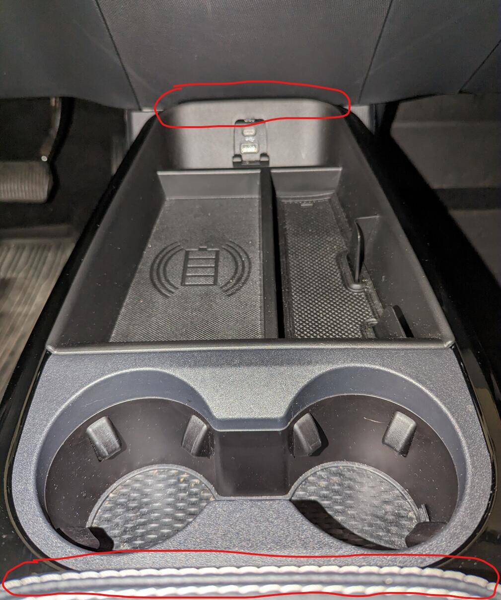 Ford Mustang Mach-E Wireless charger in media bin removal 1676604633944