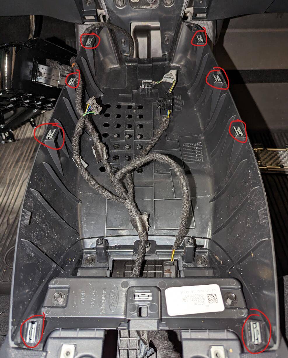 Ford Mustang Mach-E Wireless charger in media bin removal 1676604754307