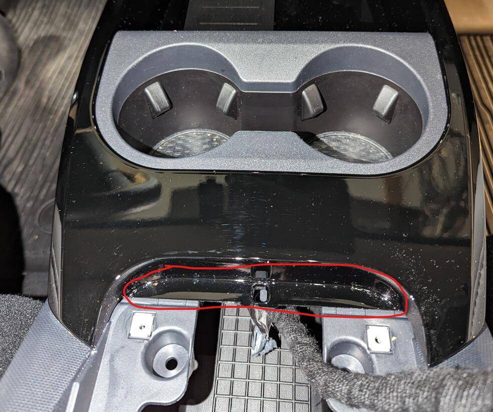 Ford Mustang Mach-E Wireless charger in media bin removal 1676605805234