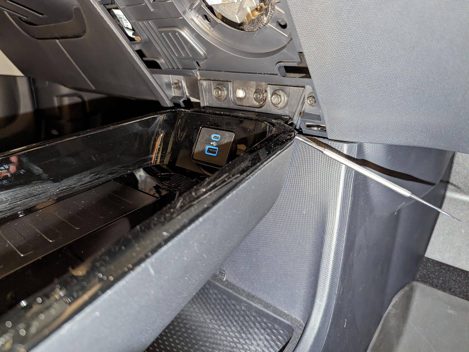 Ford Mustang Mach-E Wireless charger in media bin removal 1676606255293