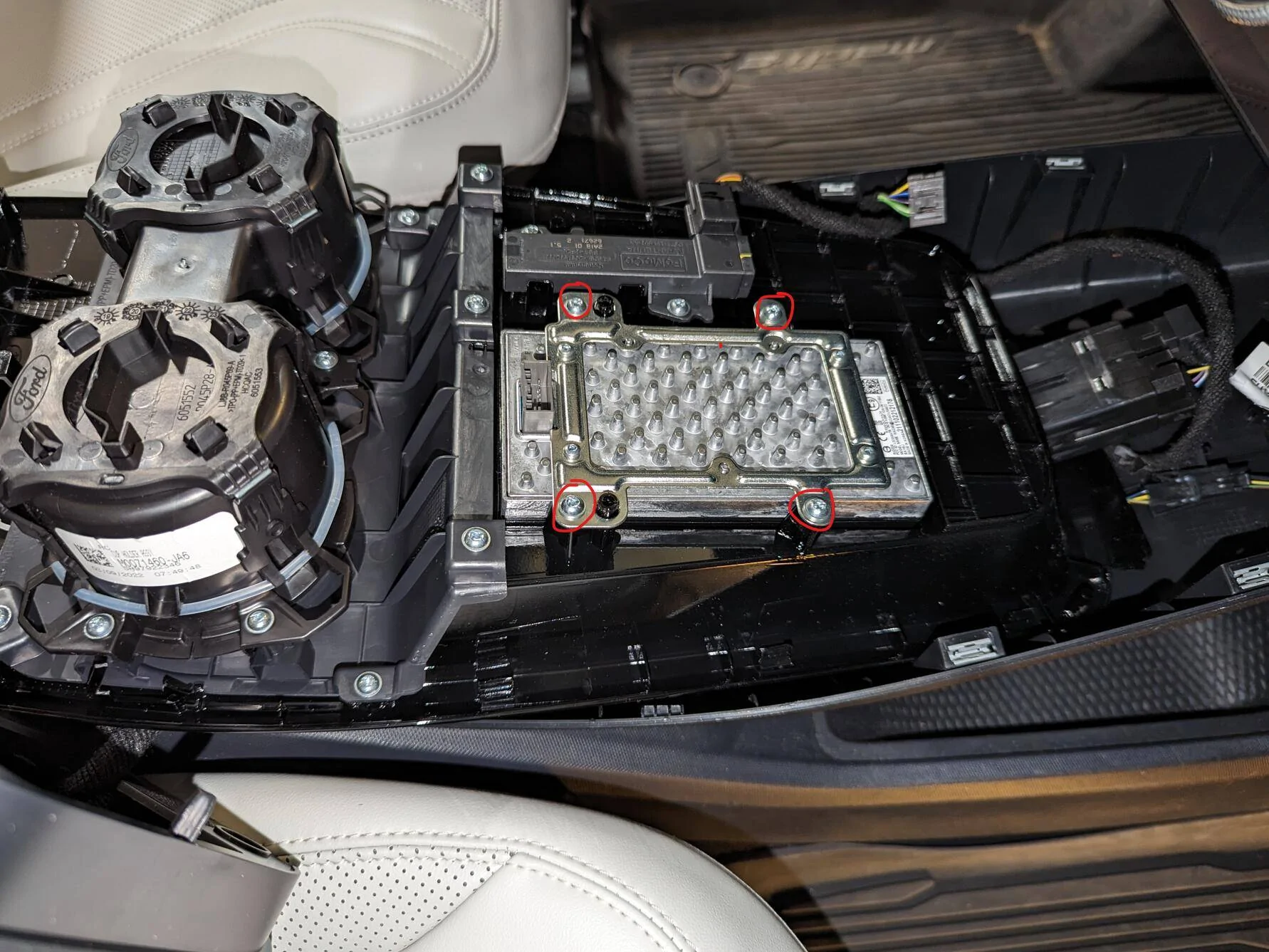 Ford Mustang Mach-E Wireless charger in media bin removal 1676606500783