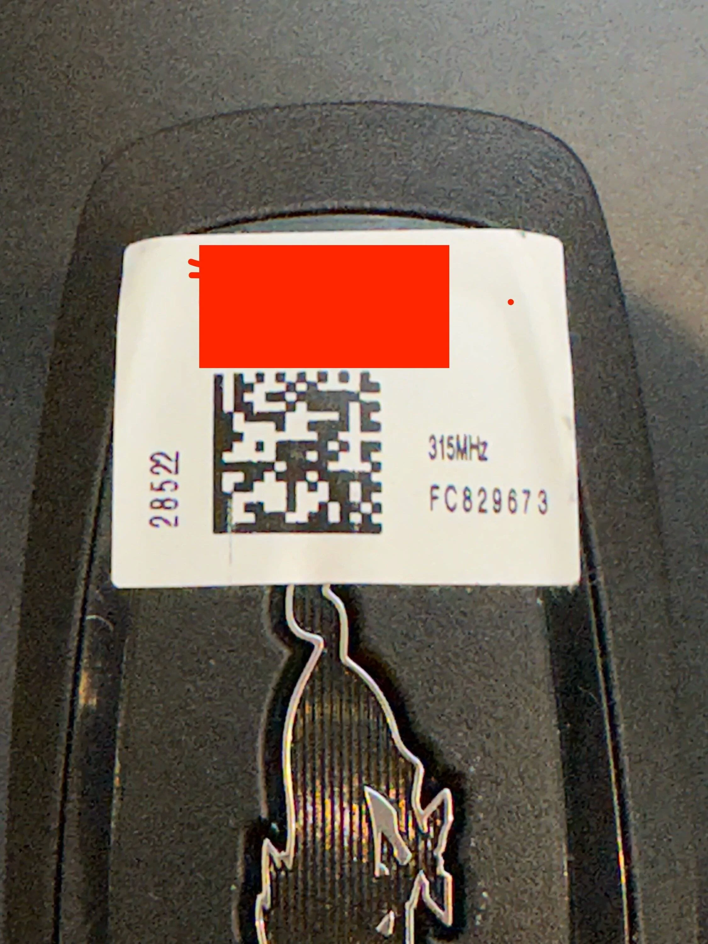 Ford Mustang Mach-E Does anyone know what this sticker on the key fob is for? IMG_9977D