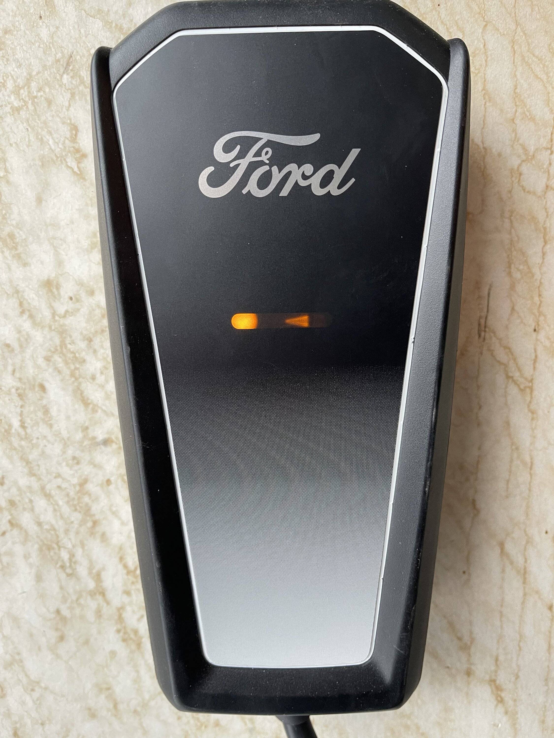 Ford Mustang Mach-E Orange light and arrow - portable charger EF580DB9-DFB7-407F-8B0F-C4837179E4F2