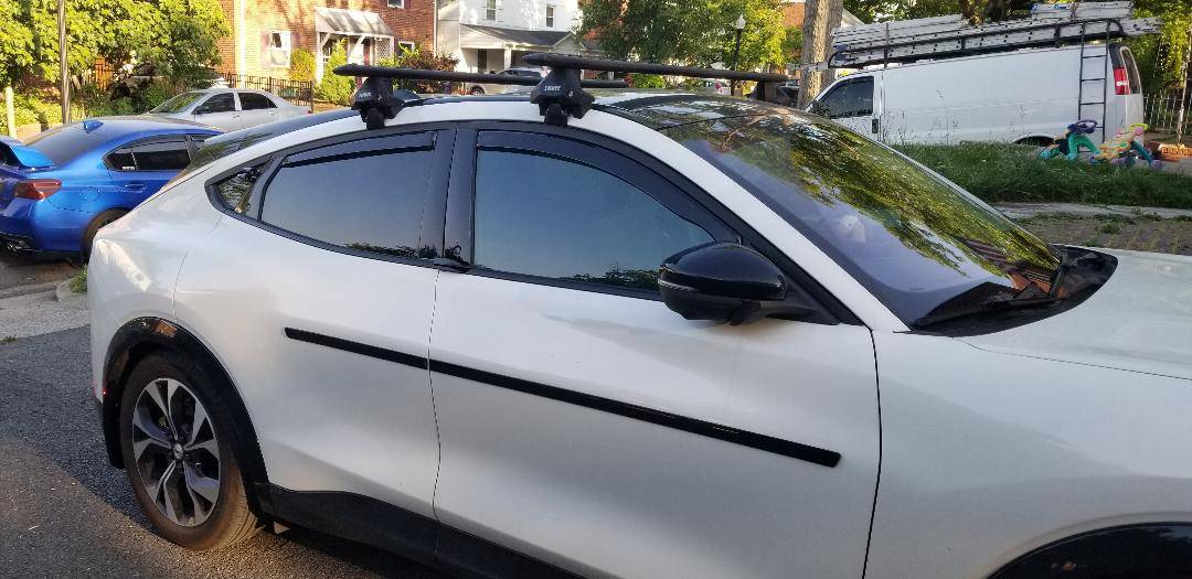 Window wind deflector from Etsy - front window invisibly cracked open.jpg