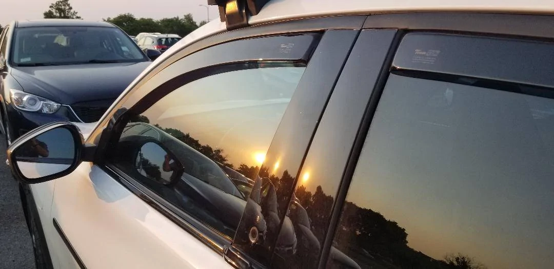 Window wind deflector from Etsy - from outside pet mode.jpg